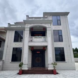 鹤岗 芝麻白石材别墅干挂案例展示